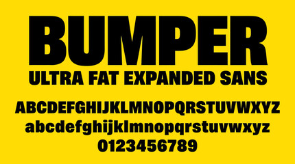 Fototapeta premium Bumper Ultra Fat Expanded Sans Font Display with Alphabet and Numbers on Yellow Background