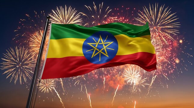 Ethiopian national flag waving on flagpole with vibrant celebratory fireworks in night sky background