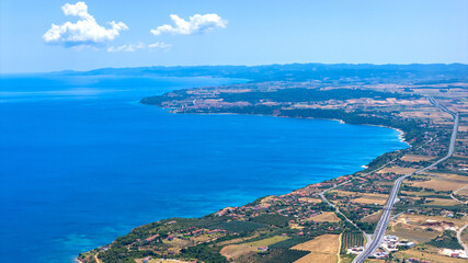 Fototapeta premium Aerial View of Kassandra Coastal Landscape and Road