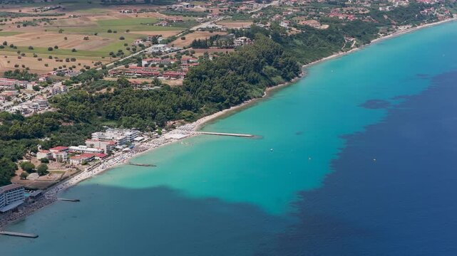 Aerial View of Coastal Beach Town with Clear Turquoise Water