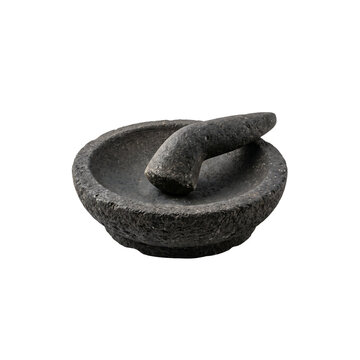 Traditional Indonesian stone mortar and pestle isolated on white background