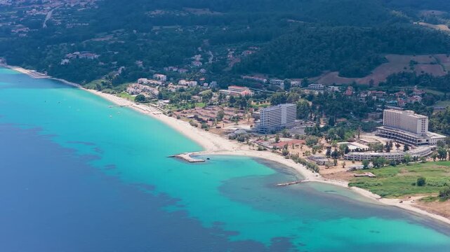 Aerial view of coastal resort area with turquoise sea and beach