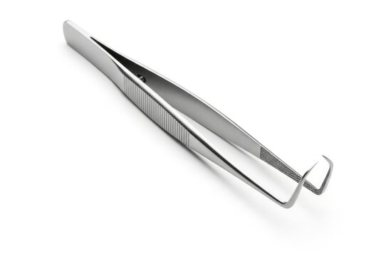 Close-up of a single silver metal tweezer on a white background.