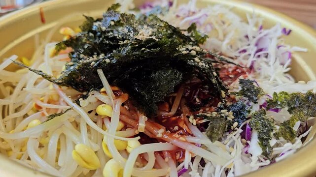 A video showing noodles, a representative commoner&rsquo;s food in Korea, served in a bowl