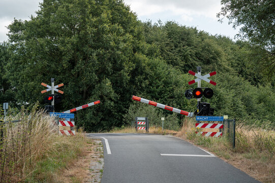 Railway crossing in lievelde with safety barriers down