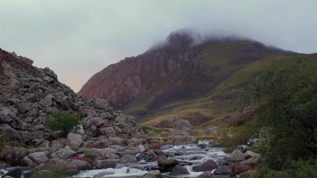 Tryffan, North Wales at sunrise with light flooding through the valley