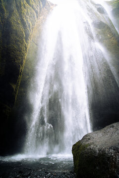 vertical photography of Gljufrabui hidden waterfall near Seljalandsfoss on a March day