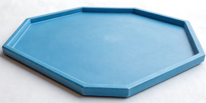 Blue octagonal shaped tray or plate on white surface