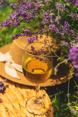 Obraz premium Wine in a lavender field. Selective focus.