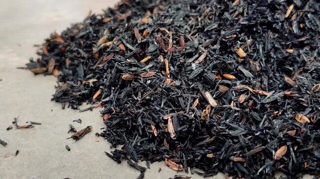 Burnt rice husk (carbonized rice hull) organic fertilizer and planting medium for gardening. This material loosens the soil, improves drainage and water absorption, and neutralizes pH