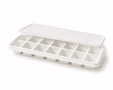 White plastic ice cube tray with lid