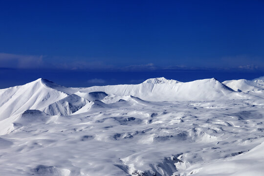 Snowy plateau and blue sky