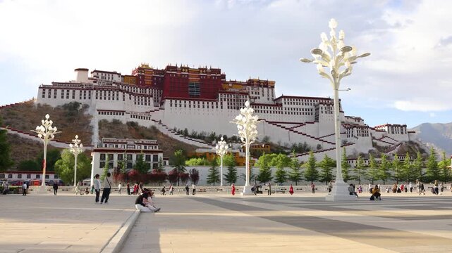 Time-lapse footage of white clouds drifting over the Potala Palace in Tibet, China