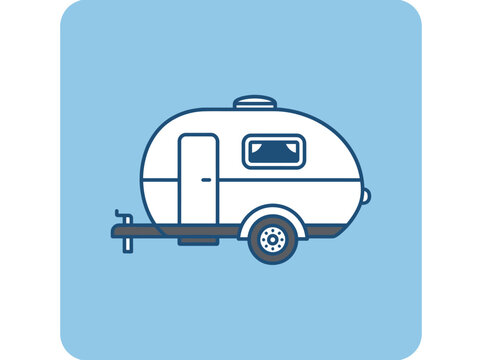 Small white vintage travel trailer.