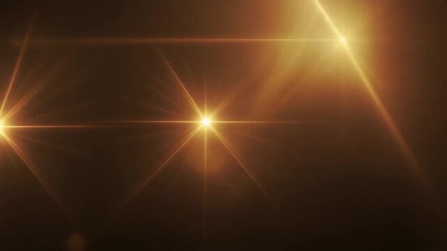 Warm golden light wash flows across deep black background, honey gold, amber, soft peach gradients creating cinematic light leak overlay for filmmaking, video editing, motion graphics, copy space.