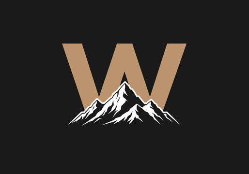 Gold letter W monogram with snowy mountain peaks.