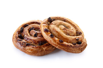 Fototapeta premium Raisin swirl pastries isolated on white background
