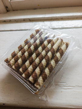 Delicious Chocolate Wafer Roll Sticks Packed inside Clear Plastic Packaging