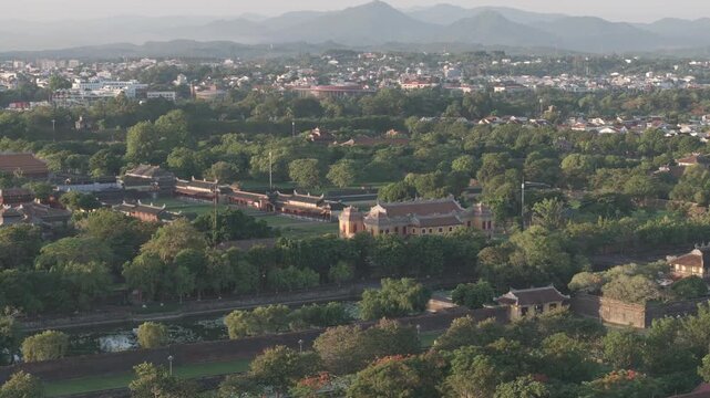 Aerial drone view of Hue Imperial Citadel featuring Ngo Mon Gate, Thai Hoa Palace and Kien Trung Palace, showcasing Vietnam's UNESCO royal heritage, ancient architecture and cultural landmark. D log m