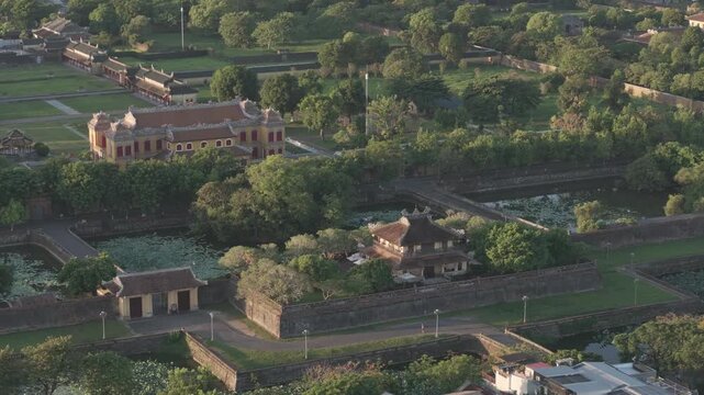 Aerial drone view of Hue Imperial Citadel featuring Ngo Mon Gate, Thai Hoa Palace and Kien Trung Palace, showcasing Vietnam's UNESCO royal heritage, ancient architecture and cultural landmark. D log m
