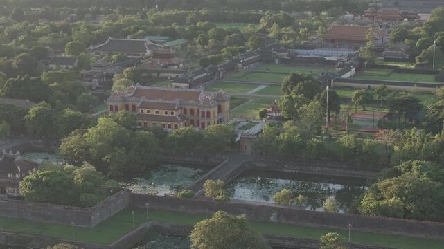 Aerial drone view of Hue Imperial Citadel featuring Ngo Mon Gate, Thai Hoa Palace and Kien Trung Palace, showcasing Vietnam's UNESCO royal heritage, ancient architecture and cultural landmark. D log m