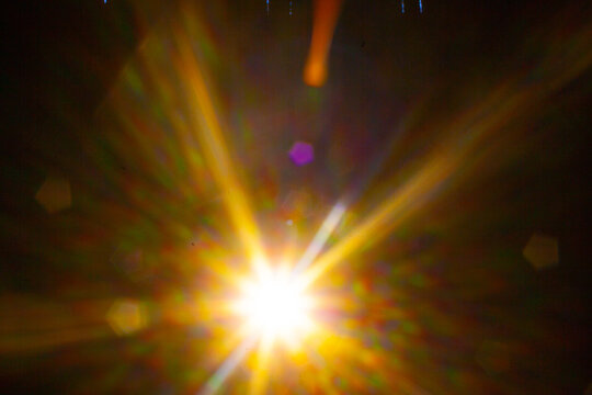 Sun flare on the black background