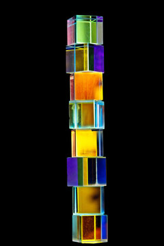 a crystal cube prism featuring light refraction and a holographic effect