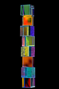 a crystal cube prism featuring light refraction and a holographic effect