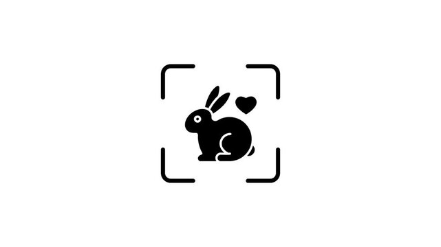 Animation of a cute rabbit silhouette inside a scanning frame with a green laser effect.