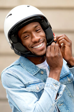 African man wearing crash helmet