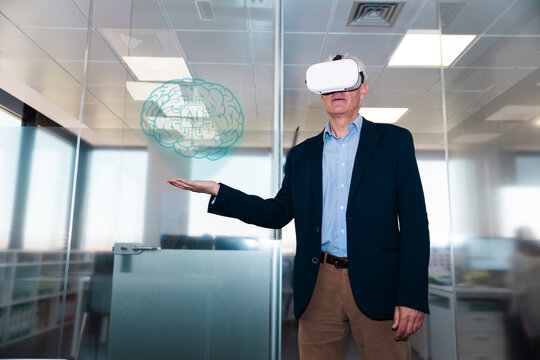 Businessman explores artificial intelligence hologram in office