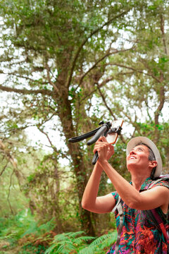 Woman Recording Forest Video