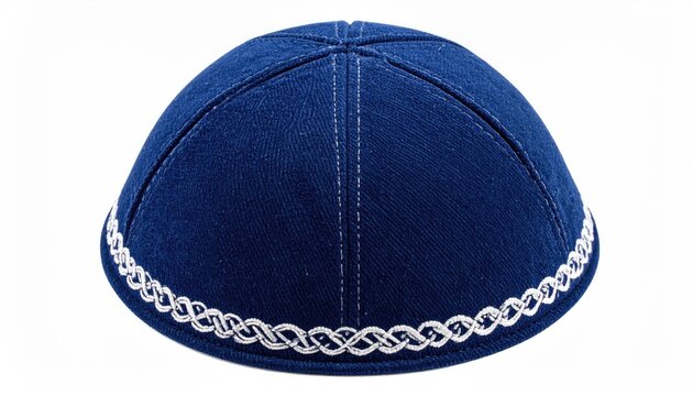 Dark blue fabric skullcap with ornate silver trim on white background
