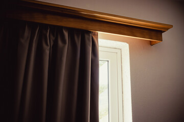 Light and heat blocking blackout curtains and curtain box in home bedroom. Minimal home decor. © FotoHelin