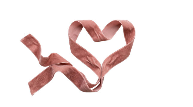 Dusty rose velvet ribbon curled into a heart shape on white background