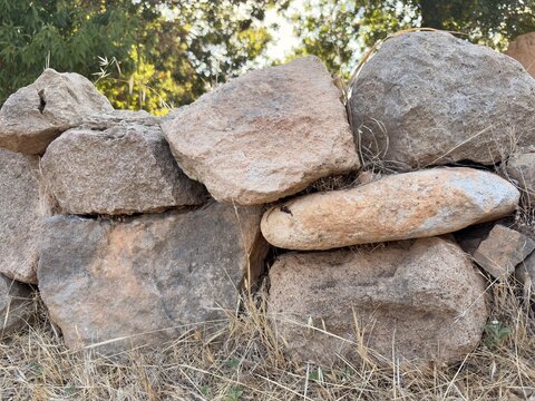 Dry stone boundary wall at the reconstructed prehistoric settlement of Lemba-Lakkoi, Paphos, Cyprus