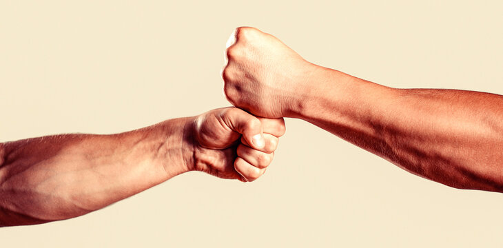 Fist bump. Clash of two fists, vs. Gesture of giving respect or approval