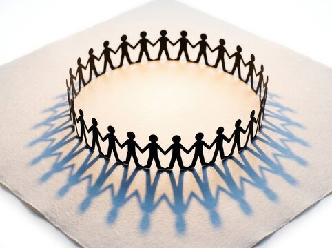 Paper chain people holding hands in a circle