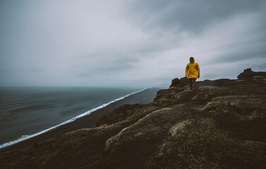 Explorer on the icelandic tour, traveling across iceland discovering natural destinations © oneinchpunch
