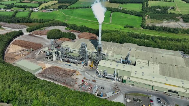 aerial view of workings at wood processing plant stockpile of logs turned to chipboard in Waterford Ireland epic Locations