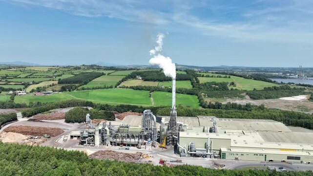 Aerial overview of wood processing plant logs turned to chipboard Industry in Waterford Ireland epic locations