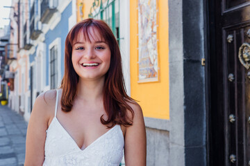 Fototapeta premium young latina woman smiling outdoors in Mexico Latin America, hispanic and mexican female portrait
