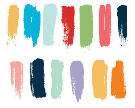 Set of colorful brush strokes isolated on white. Grunge ink splashes. Set of hand drawn multicolor brush strokes isolated on white background. Grunge ink splashes collection