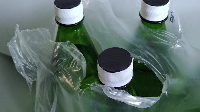 Pack of bottled drinking water on floor, emergency water supply, household water reserve and preparedness concept.