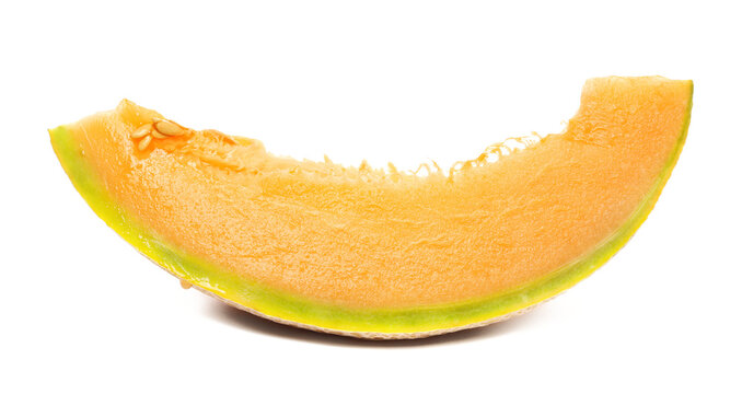 Cantaloupe melon organic, honeydew slice with seeds isolated on white background
