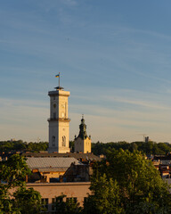 Obraz premium Lviv Town Hall tower at golden hour, Lviv, Ukraine