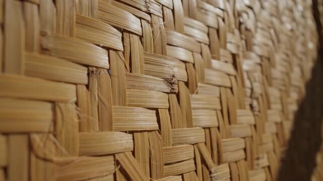 Close up of traditional woven bamboo texture with soft lighting