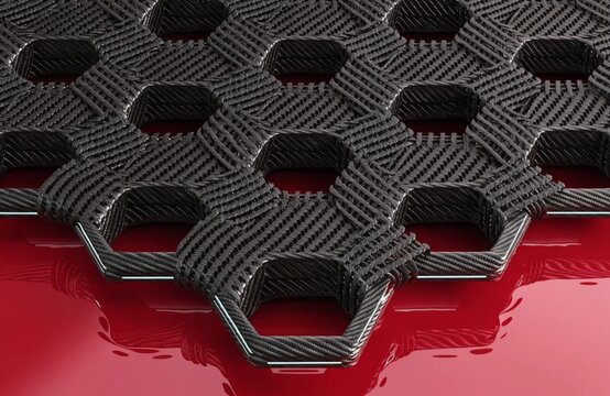 Isometric 3D render of black woven carbon fiber hexagonal mesh structure resting on reflective glossy red surface, futuristic composite background, generative AI