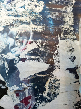 Torn and ripped urban paper poster background, messy paper old urban texture background