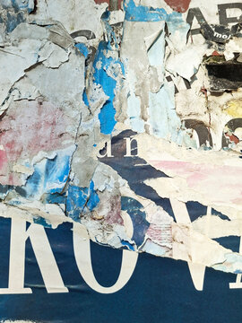 Torn and ripped urban paper poster background, messy paper old urban texture background